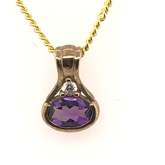 9K YG OVAL AMETHYST AND DIAMOND PENDANT